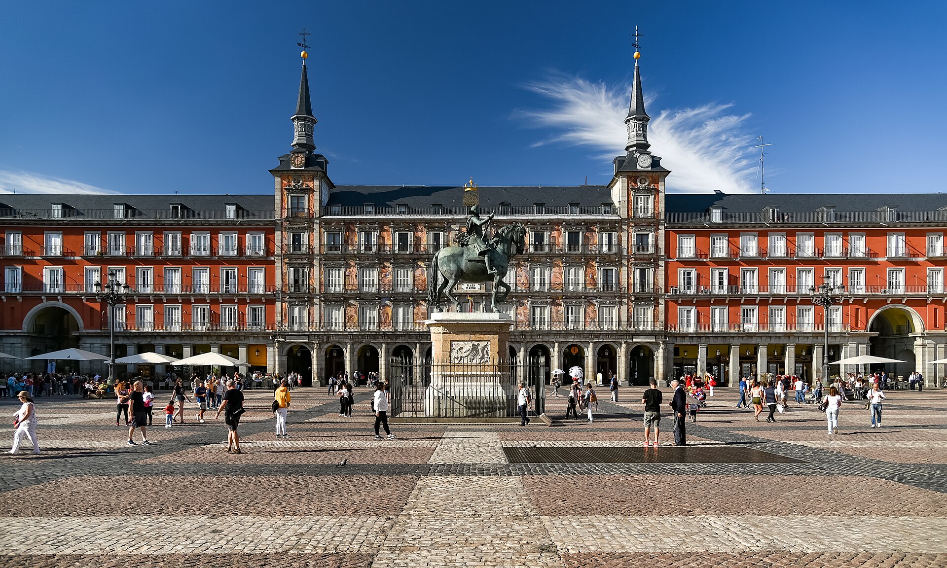The Plaza Mayor in Madrid with its arcades and lampposts